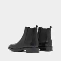 Boots basses à élastiques et détails ajourés