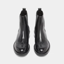 Boots basses à élastiques et détails ajourés