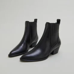 Boots à petits talons biseautés et élast...