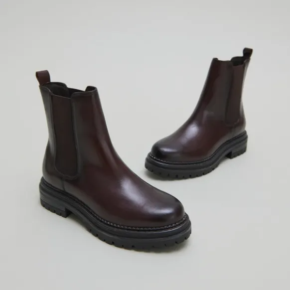 Boots à semelles crantées et élastiqu...