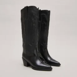 Bottes à talons épais et surpiqures apparentes