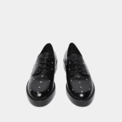 Derbies à détails argentés