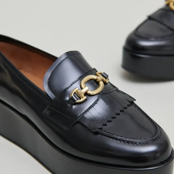 Mocassins à boucles dorées