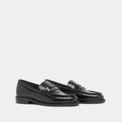 Mocassins à bouts ronds et monogrammes