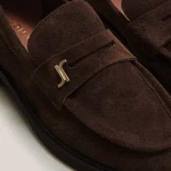 Mocassins à bouts ronds et monogrammes