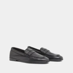 Mocassins à talons plats et bouts arrond...