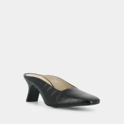 Mules à talon incliné